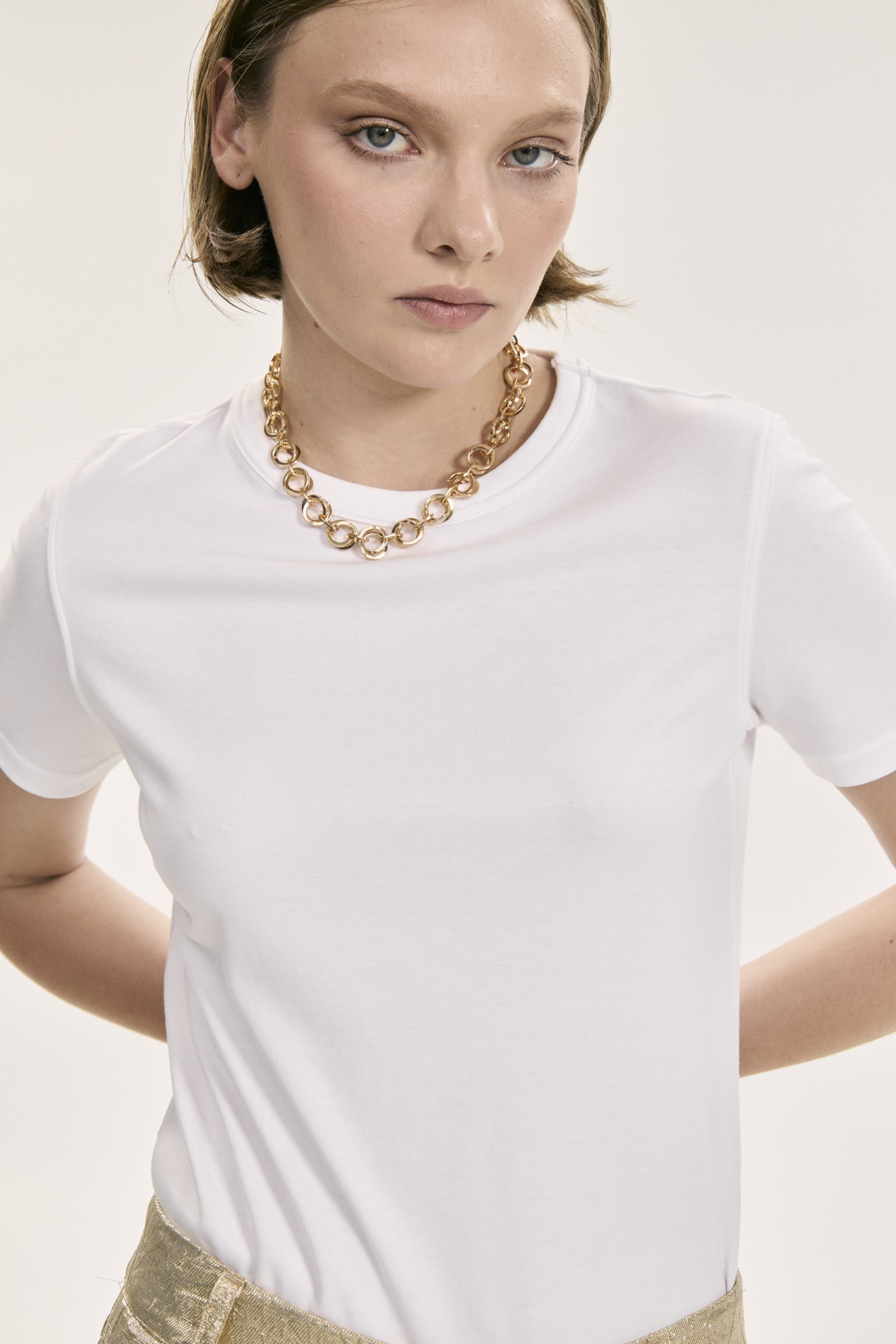 White tee with chain necklace